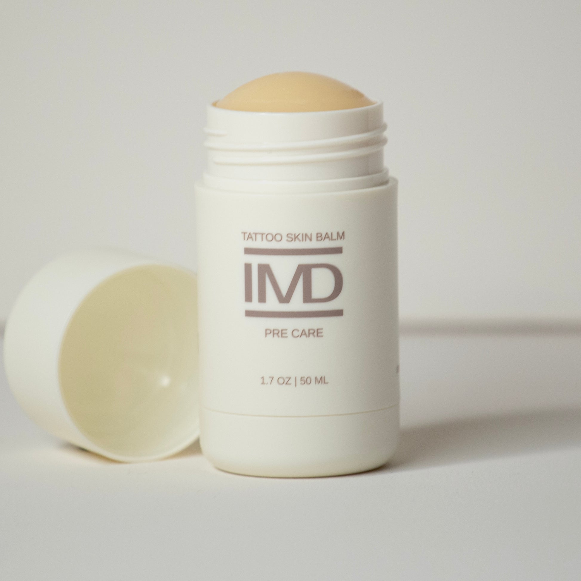IMD Pre Care Tattoo Skin Balm in a 1.7 oz stick — all-natural, plant-based balm to prep skin before getting a new tattoo