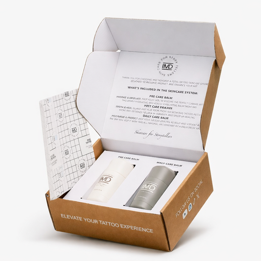 IMD Tattoo Skincare Kit opened box — complete 3-step system with Pre Care Balm, Daily Care Balm, and Post Care Tattoo Patch